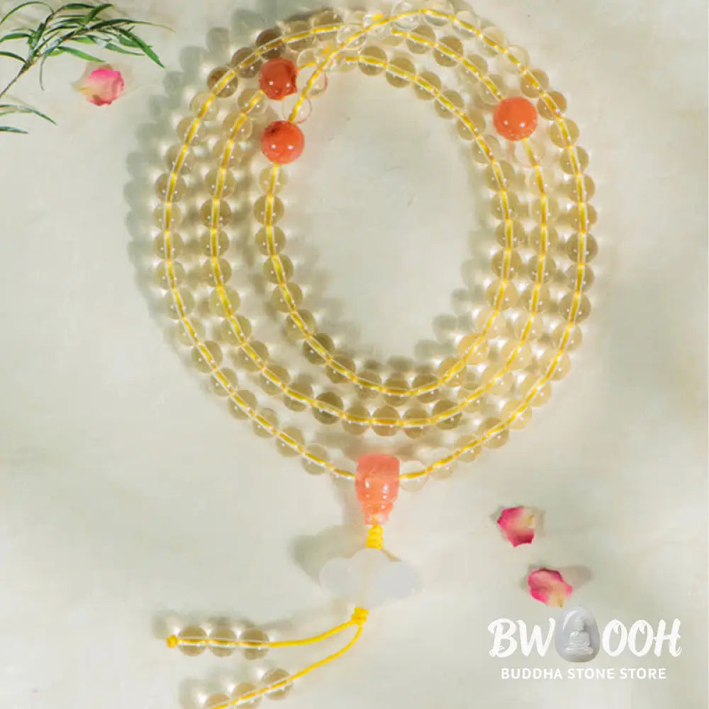 BWOOOH 108 Mala Beads bracelet, 6mm natural Citrine, Red Agate, White Jade, and 925 Sterling Silver beads. Features a sterling silver Lotus charm, symbolizing enlightenment and resilience. Elastic string, ideal for meditation and intention setting. - View 10