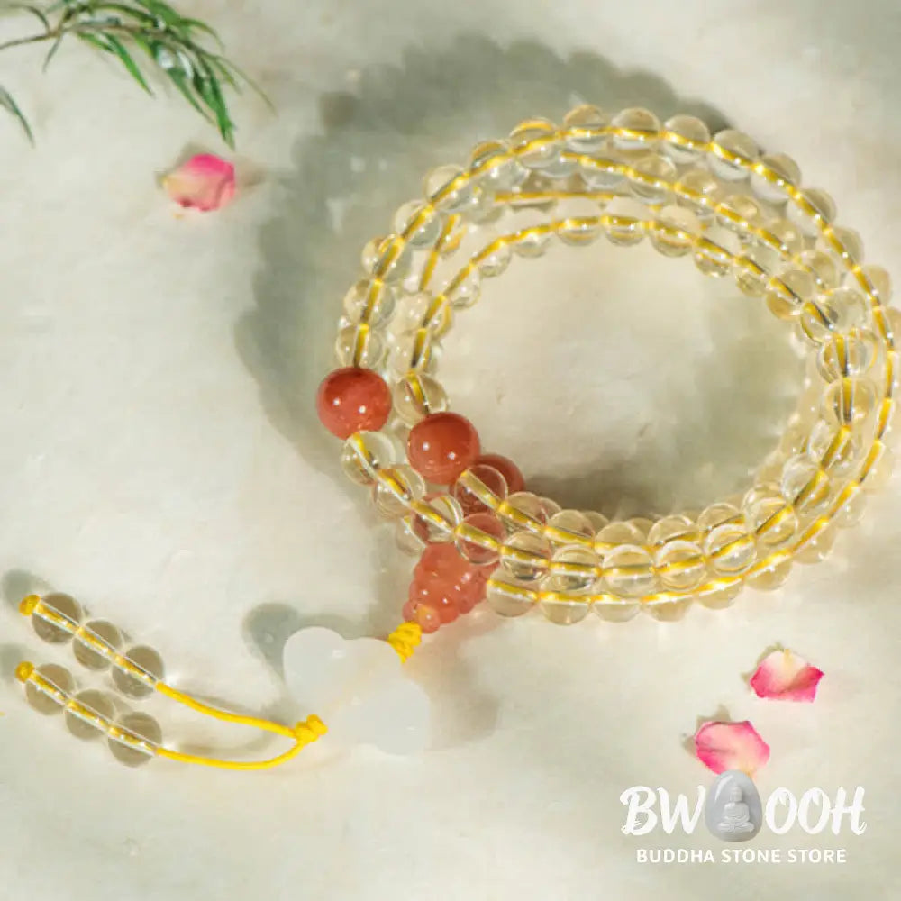 BWOOOH 108 Mala Beads bracelet, 6mm natural Citrine, Red Agate, White Jade, and 925 Sterling Silver beads. Features a sterling silver Lotus charm, symbolizing enlightenment and resilience. Elastic string, ideal for meditation and intention setting. - View 11