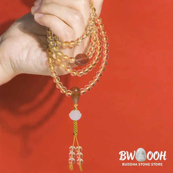 BWOOOH 108 Mala Beads bracelet, 6mm natural Citrine, Red Agate, White Jade, and 925 Sterling Silver beads. Features a sterling silver Lotus charm, symbolizing enlightenment and resilience. Elastic string, ideal for meditation and intention setting. - View 12