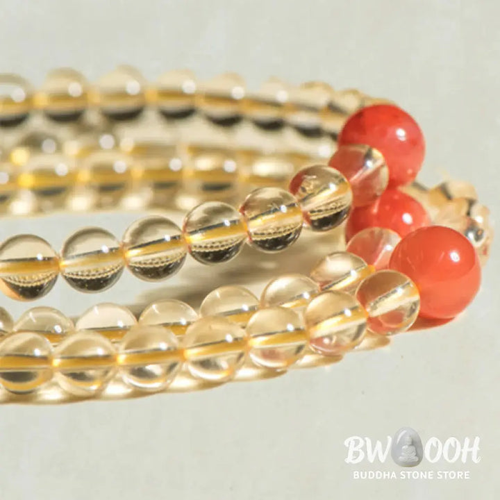BWOOOH 108 Mala Beads bracelet, 6mm natural Citrine, Red Agate, White Jade, and 925 Sterling Silver beads. Features a sterling silver Lotus charm, symbolizing enlightenment and resilience. Elastic string, ideal for meditation and intention setting. - View 21