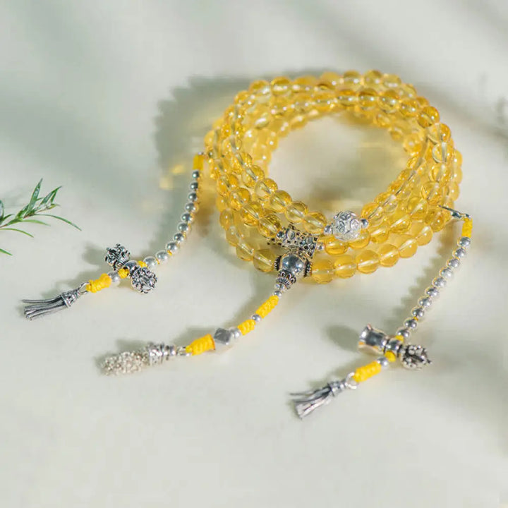 BWOOOH 108 Mala Beads bracelet, 6mm natural Citrine, Red Agate, White Jade, and 925 Sterling Silver beads. Features a sterling silver Lotus charm, symbolizing enlightenment and resilience. Elastic string, ideal for meditation and intention setting. - View 22