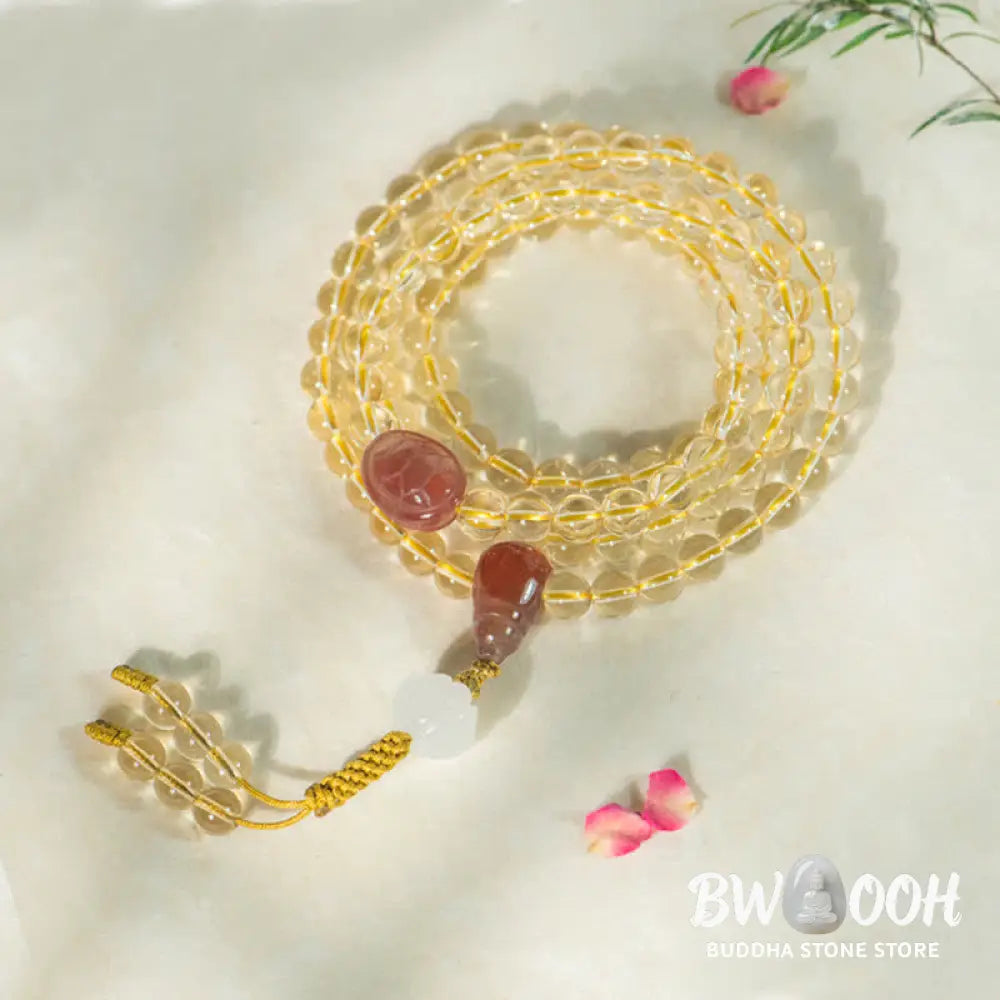 BWOOOH 108 Mala Beads bracelet, 6mm natural Citrine, Red Agate, White Jade, and 925 Sterling Silver beads. Features a sterling silver Lotus charm, symbolizing enlightenment and resilience. Elastic string, ideal for meditation and intention setting. - View 2