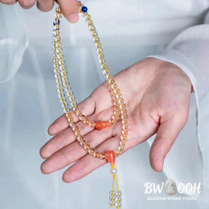 BWOOOH 108 Mala Beads bracelet, 6mm natural Citrine, Red Agate, White Jade, and 925 Sterling Silver beads. Features a sterling silver Lotus charm, symbolizing enlightenment and resilience. Elastic string, ideal for meditation and intention setting. - View 16