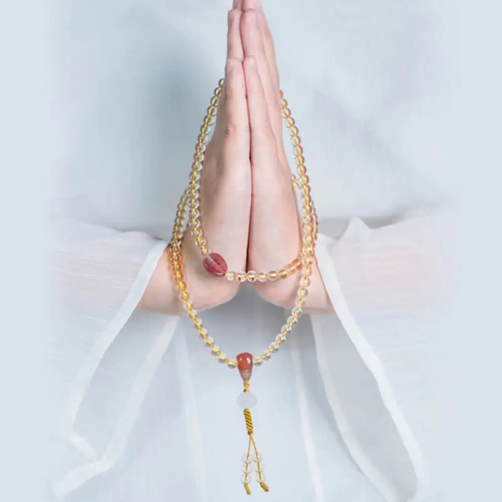 BWOOOH 108 Mala Beads bracelet, 6mm natural Citrine, Red Agate, White Jade, and 925 Sterling Silver beads. Features a sterling silver Lotus charm, symbolizing enlightenment and resilience. Elastic string, ideal for meditation and intention setting.