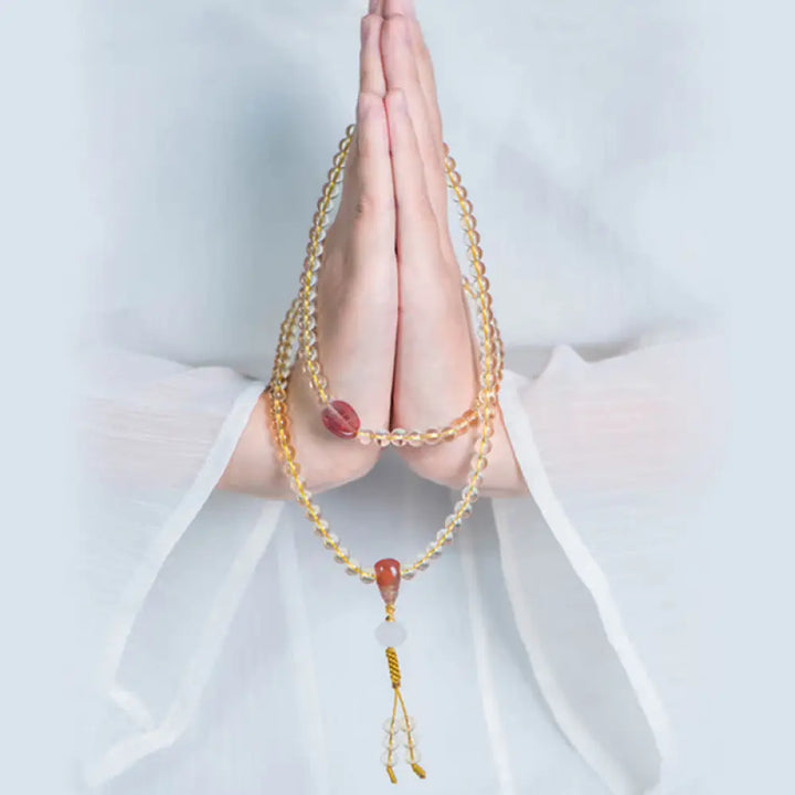 BWOOOH 108 Mala Beads bracelet, 6mm natural Citrine, Red Agate, White Jade, and 925 Sterling Silver beads. Features a sterling silver Lotus charm, symbolizing enlightenment and resilience. Elastic string, ideal for meditation and intention setting.