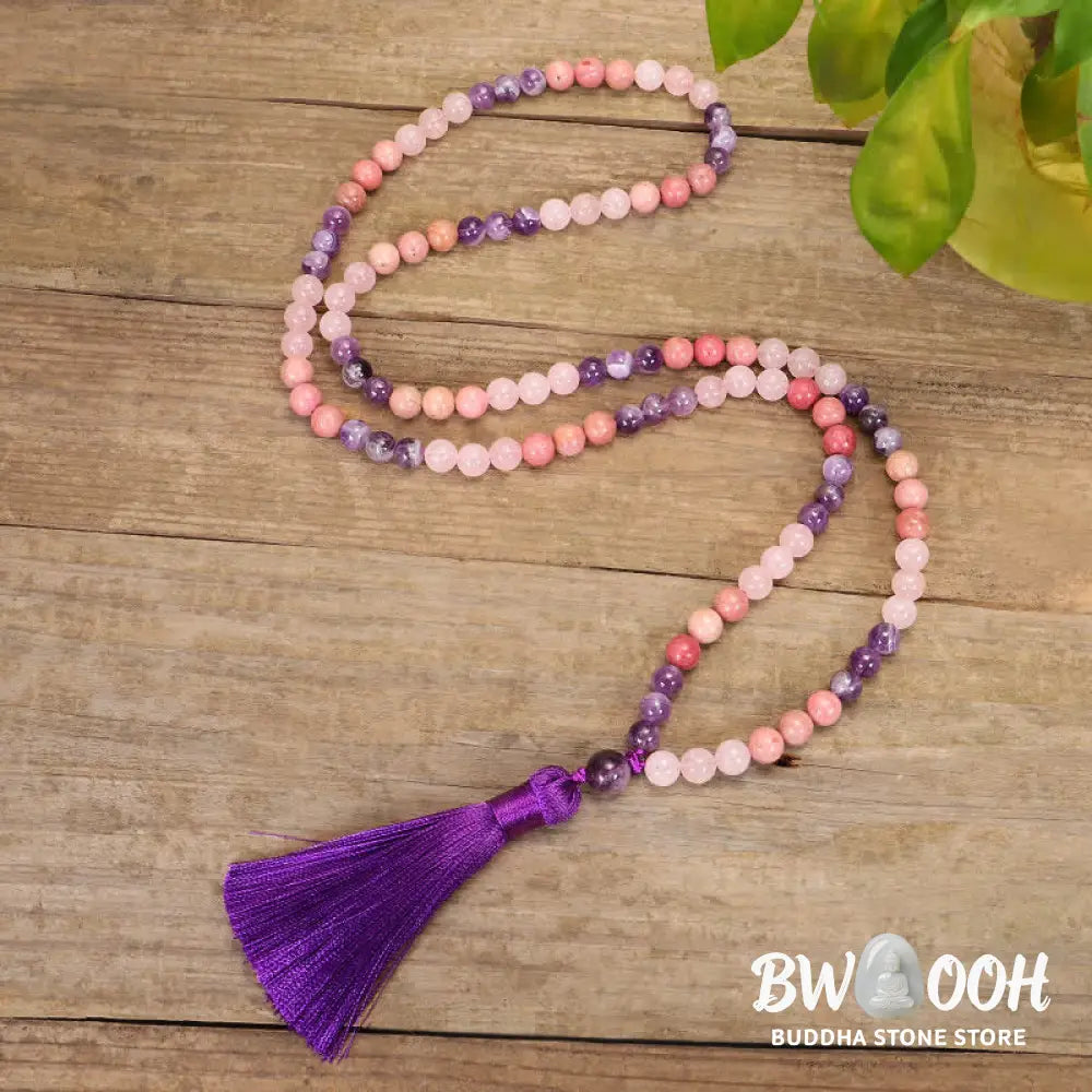 BWOOOH 108 Amethyst Rose Quartz Mala beads bracelet with a delicate tassel, handcrafted for meditation, stress relief, and fostering self-love and inner peace. The smooth purple Amethyst and soft pink Rose Quartz gemstones are clearly visible on a premium elastic string, ready to be worn as a bracelet or necklace. - View 8