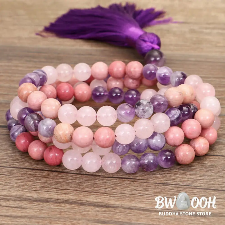 BWOOOH 108 Amethyst Rose Quartz Mala beads bracelet with a delicate tassel, handcrafted for meditation, stress relief, and fostering self-love and inner peace. The smooth purple Amethyst and soft pink Rose Quartz gemstones are clearly visible on a premium elastic string, ready to be worn as a bracelet or necklace. - View 10