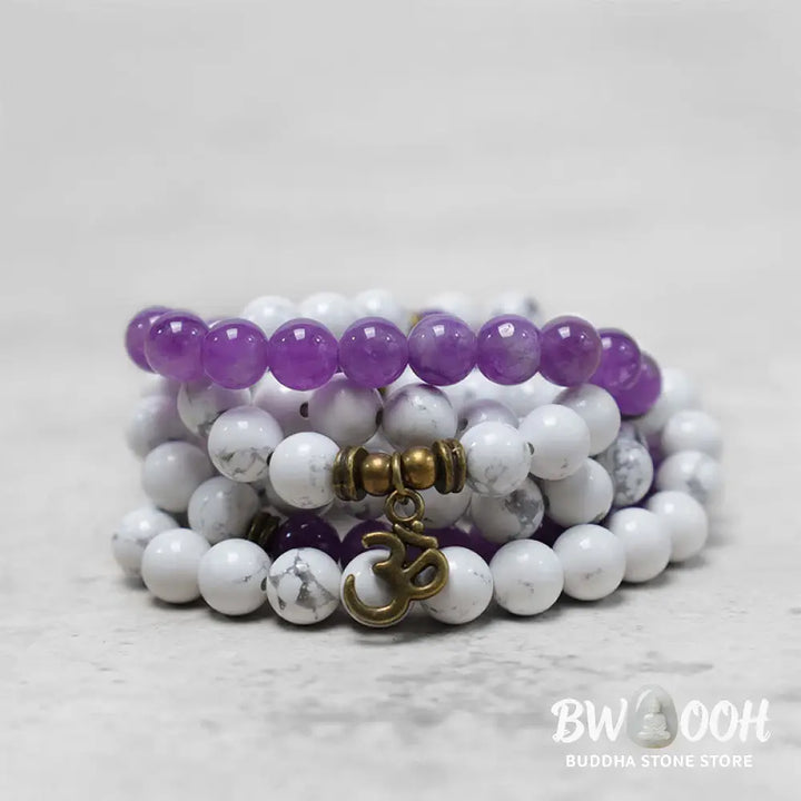 BWOOOH 108-bead Amethyst and White Turquoise OM Mala bracelet, featuring deep purple amethyst, serene white turquoise, and a central OM symbol on premium elastic string, designed for meditation, emotional balance, and spiritual healing. - View 4