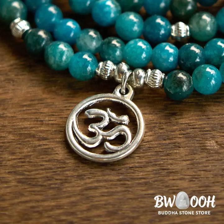 BWOOOH Apatite 108 Mala Beads bracelet with an intricate Om, Tree of Life, or Lotus pendant. This 6mm natural apatite bead mala is designed for meditation, spiritual clarity, and balancing inner energy. - View 4