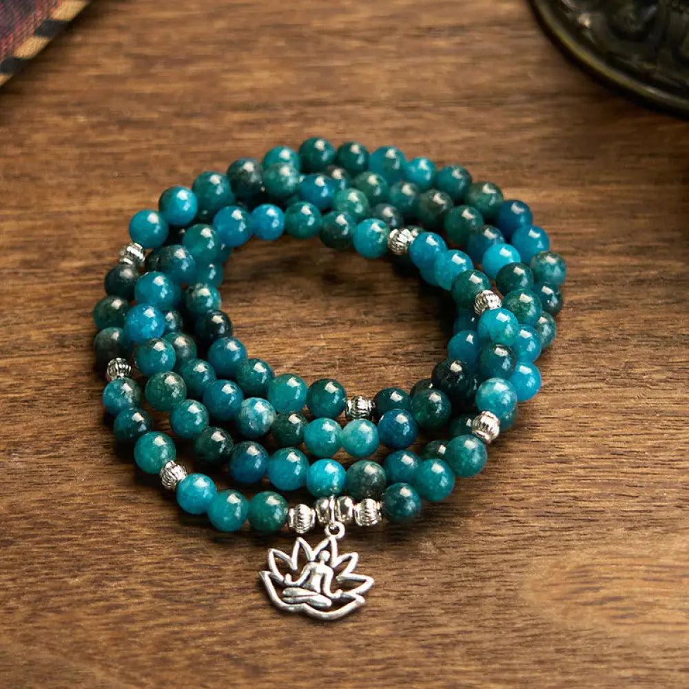 BWOOOH Apatite 108 Mala Beads bracelet with an intricate Om, Tree of Life, or Lotus pendant. This 6mm natural apatite bead mala is designed for meditation, spiritual clarity, and balancing inner energy. - View 12