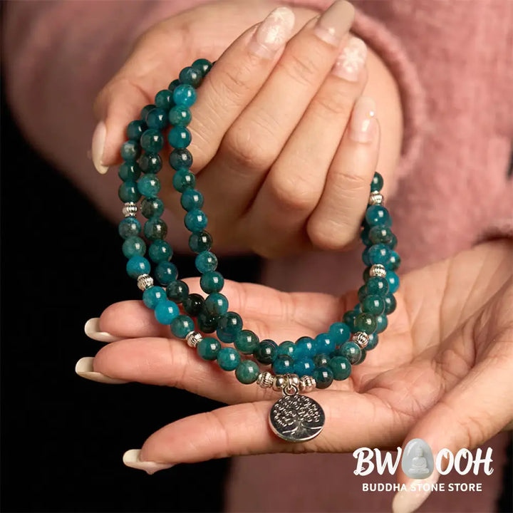 BWOOOH Apatite 108 Mala Beads bracelet with an intricate Om, Tree of Life, or Lotus pendant. This 6mm natural apatite bead mala is designed for meditation, spiritual clarity, and balancing inner energy. - View 9