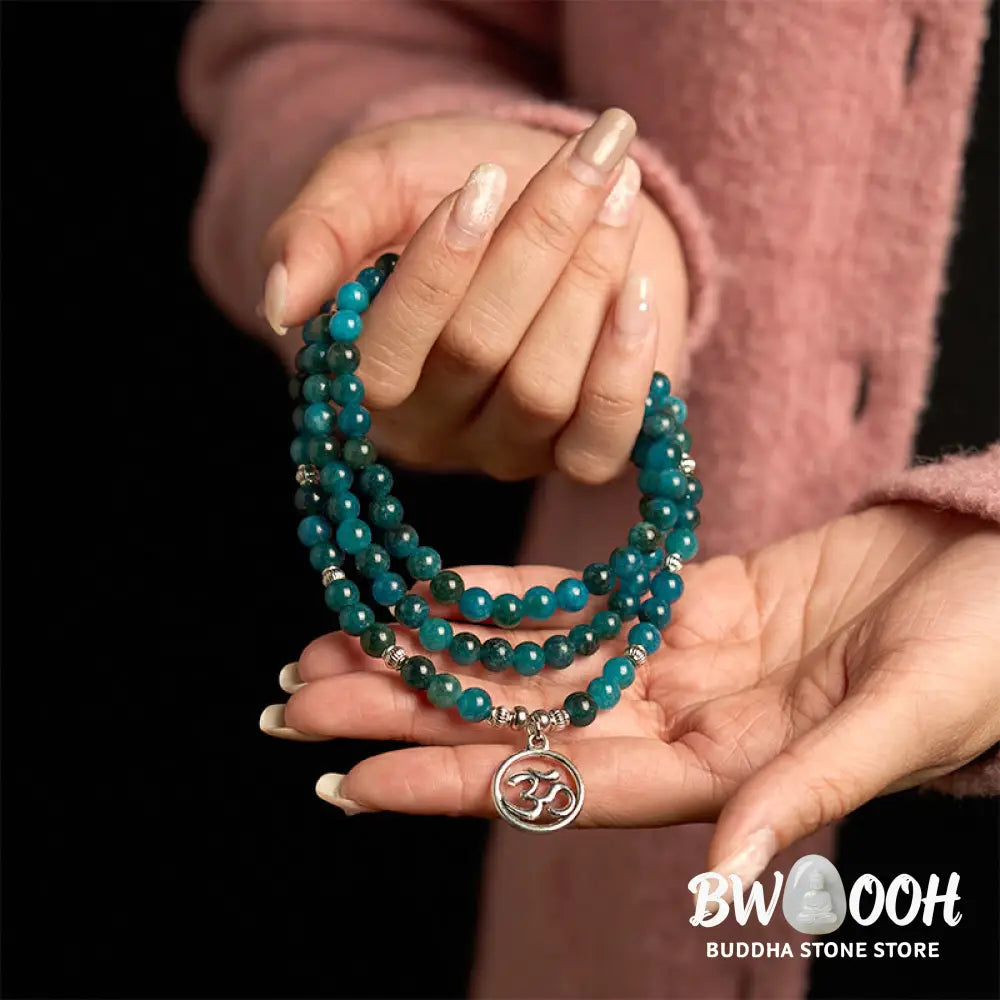 BWOOOH Apatite 108 Mala Beads bracelet with an intricate Om, Tree of Life, or Lotus pendant. This 6mm natural apatite bead mala is designed for meditation, spiritual clarity, and balancing inner energy. - View 3