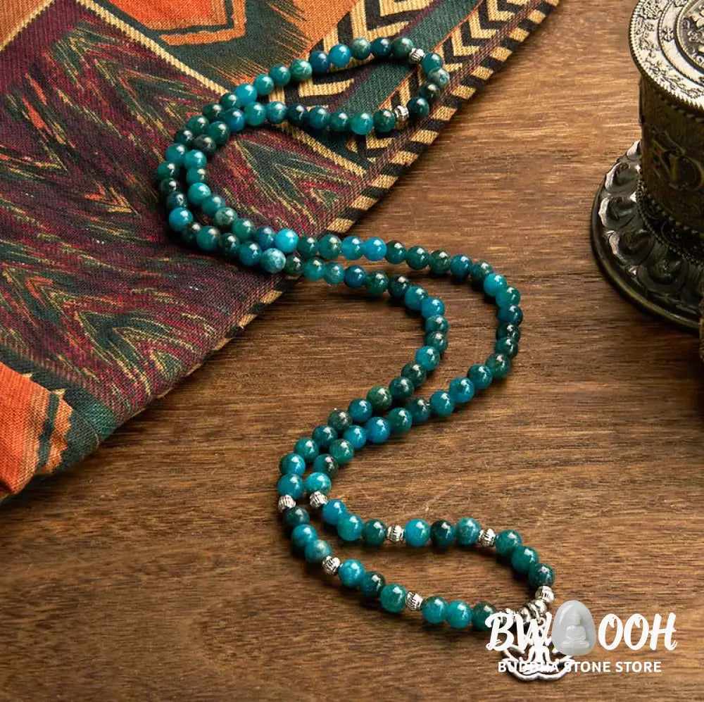BWOOOH Apatite 108 Mala Beads bracelet with an intricate Om, Tree of Life, or Lotus pendant. This 6mm natural apatite bead mala is designed for meditation, spiritual clarity, and balancing inner energy. - View 13