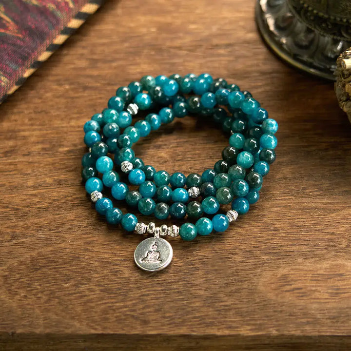 BWOOOH Apatite 108 Mala Beads bracelet with an intricate Om, Tree of Life, or Lotus pendant. This 6mm natural apatite bead mala is designed for meditation, spiritual clarity, and balancing inner energy. - View 18