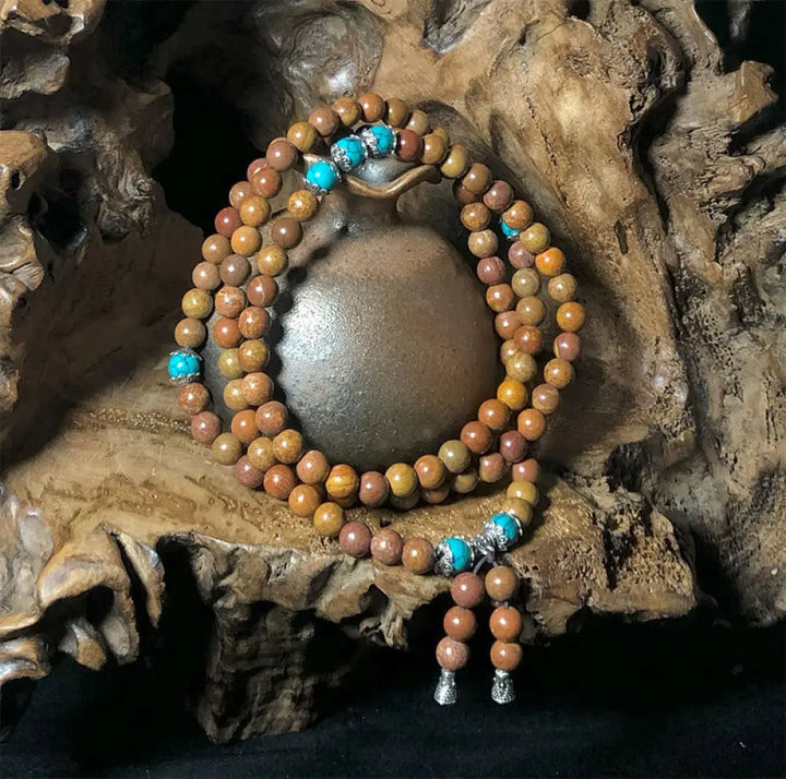 BWOOOH 108 Bian Stone Mala Healing Bracelet, featuring 6-7mm greyish beads on premium elastic string for unisex meditation &amp; spiritual protection.