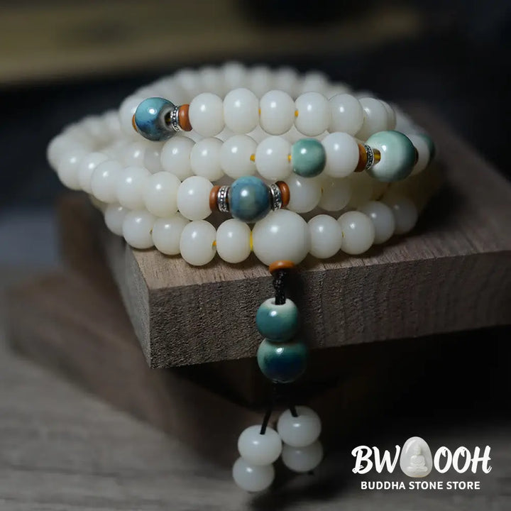 Close-up of BWOOOH 108 Bodhi Seed Mala beads, dark-speckled, strung on premium elastic, symbolizing wisdom, protection, and deep calm for meditation. - View 11