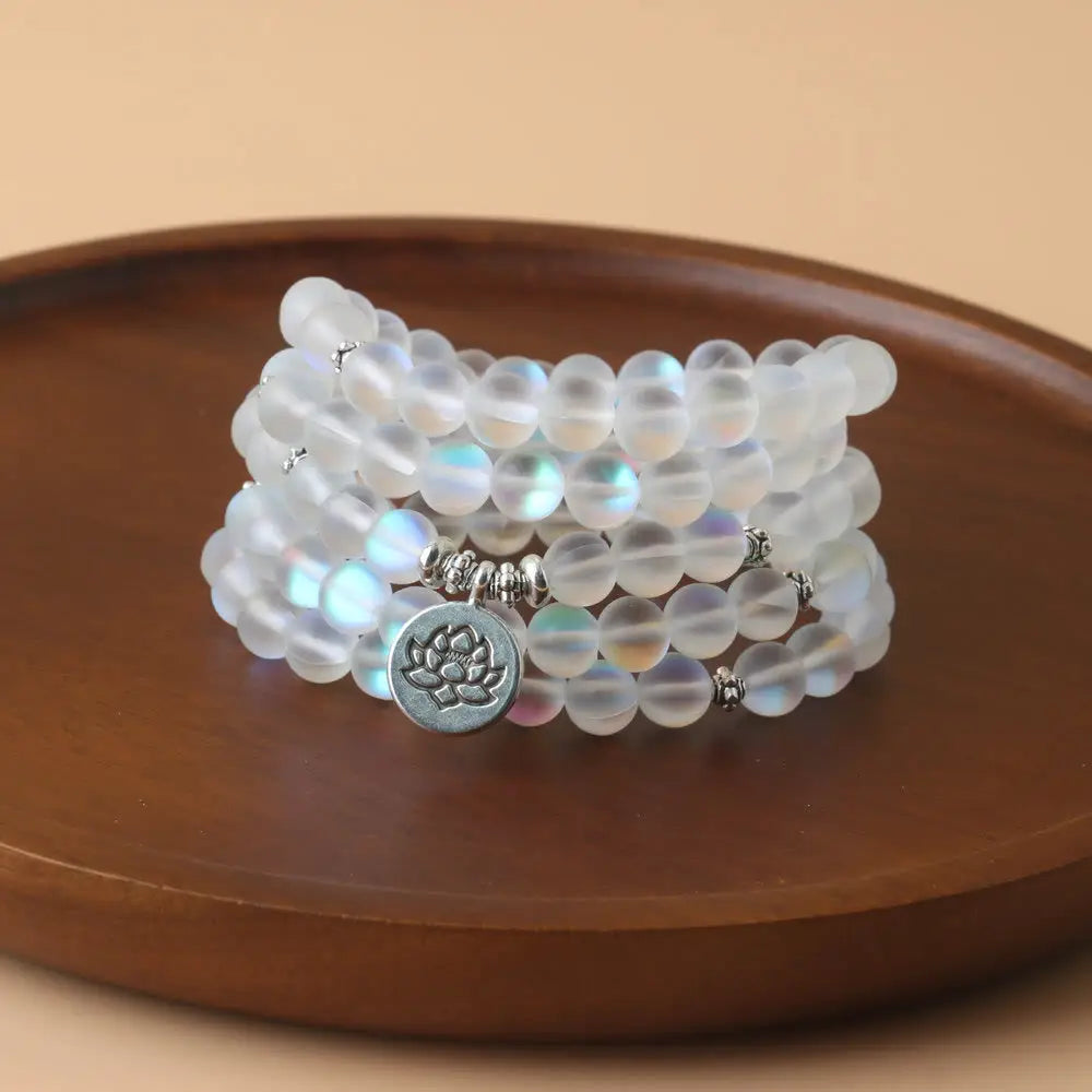 BWOOOH 108 Glitter Stone Lotus Enlightenment Bracelet, featuring 108 synthetic glitter beads on an elastic string with a round lotus-engraved alloy pendant, ideal for mindful meditation.