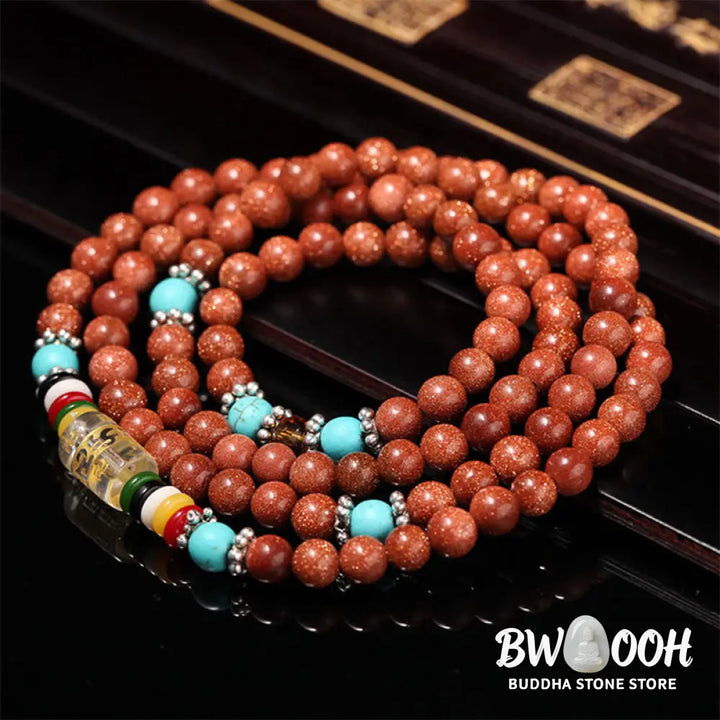 BWOOOH 108 Goldstone Mala Confidence Bracelet with Om Mani Padme Hum and Swastika symbols, promoting spiritual focus, balance, and positive energy during meditation. - View 7