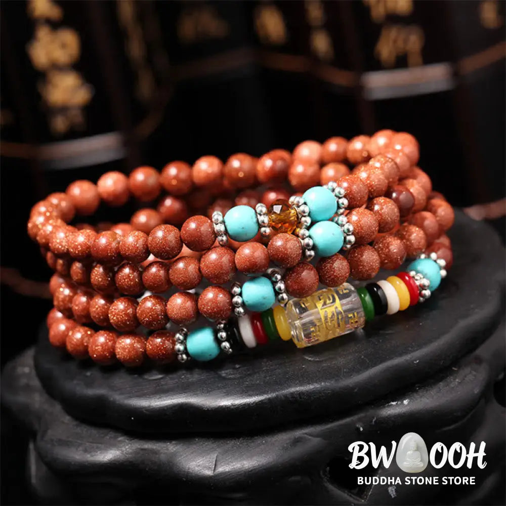 BWOOOH 108 Goldstone Mala Confidence Bracelet with Om Mani Padme Hum and Swastika symbols, promoting spiritual focus, balance, and positive energy during meditation. - View 2
