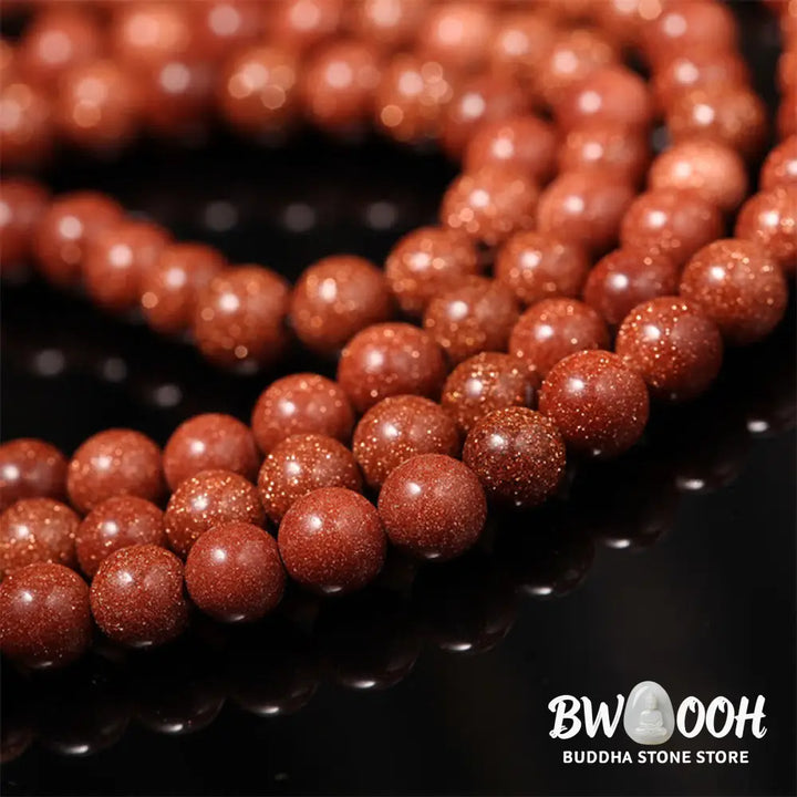 BWOOOH 108 Goldstone Mala Confidence Bracelet with Om Mani Padme Hum and Swastika symbols, promoting spiritual focus, balance, and positive energy during meditation. - View 3