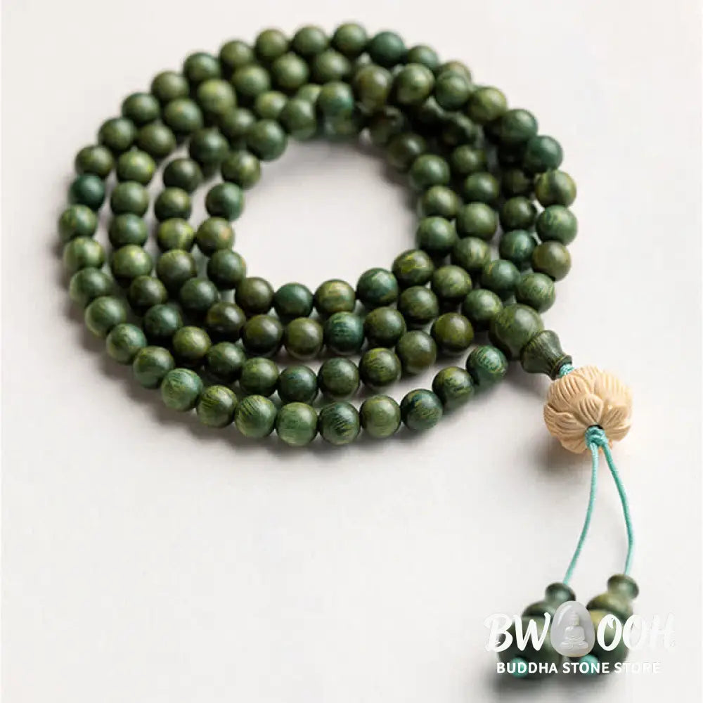 BWOOOH 108 mala beads bracelet crafted from natural green sandalwood and boxwood, featuring a distinct lotus symbol charm, designed for meditation, positive energy, and spiritual tranquility. - View 5