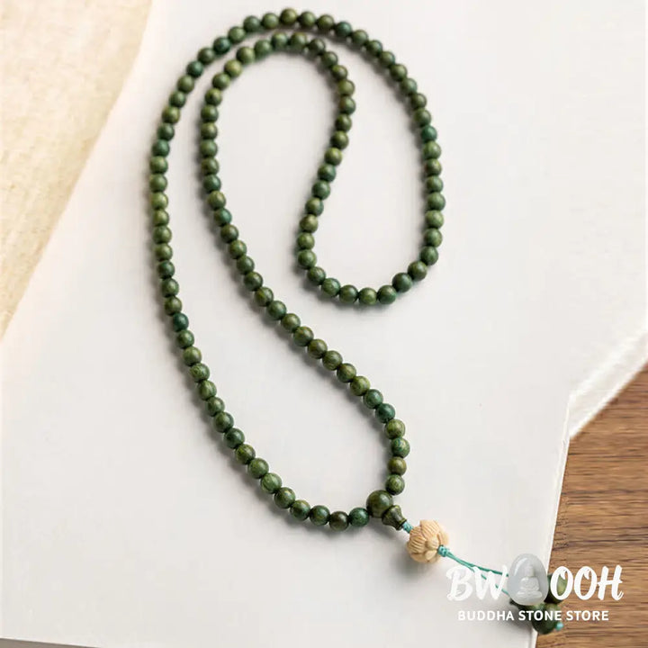 BWOOOH 108 mala beads bracelet crafted from natural green sandalwood and boxwood, featuring a distinct lotus symbol charm, designed for meditation, positive energy, and spiritual tranquility. - View 20