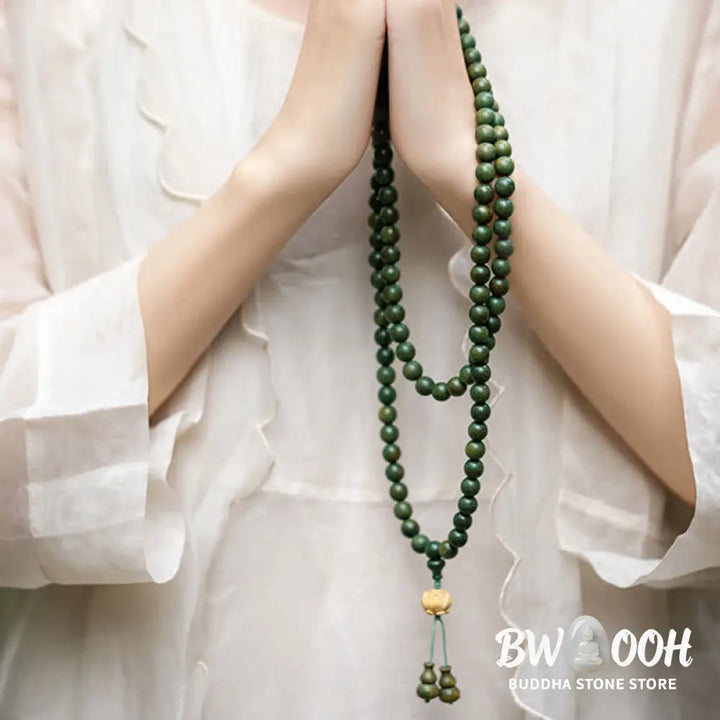 BWOOOH 108 mala beads bracelet crafted from natural green sandalwood and boxwood, featuring a distinct lotus symbol charm, designed for meditation, positive energy, and spiritual tranquility. - View 7