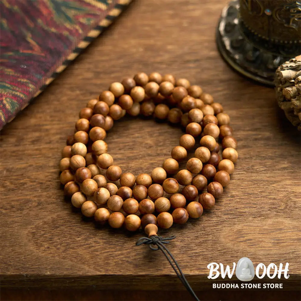 BWOOOH 108 Mala Beads, hand-polished Lightning Strike Peach Wood protection bracelet, 8mm beads on elastic string, worn by a unisex model, symbolizing divine energy and spiritual balance. - View 6