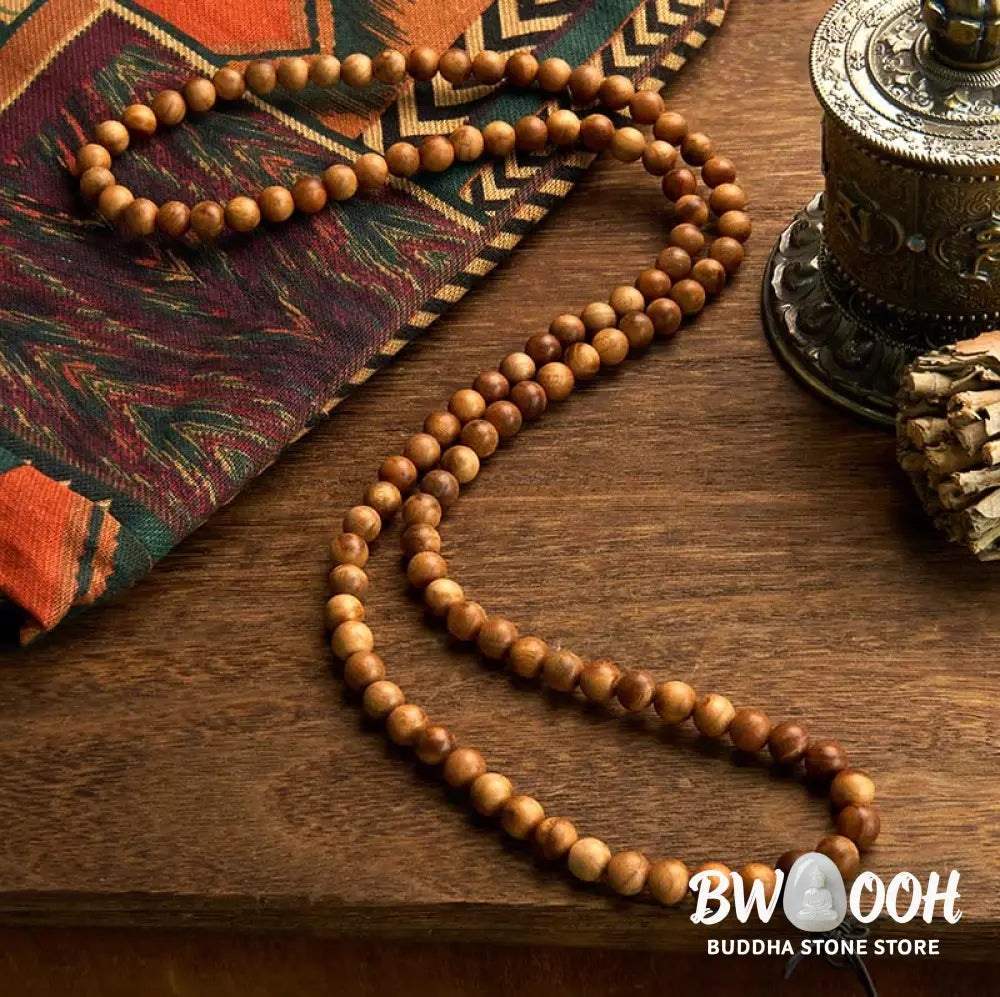 BWOOOH 108 Mala Beads, hand-polished Lightning Strike Peach Wood protection bracelet, 8mm beads on elastic string, worn by a unisex model, symbolizing divine energy and spiritual balance. - View 2