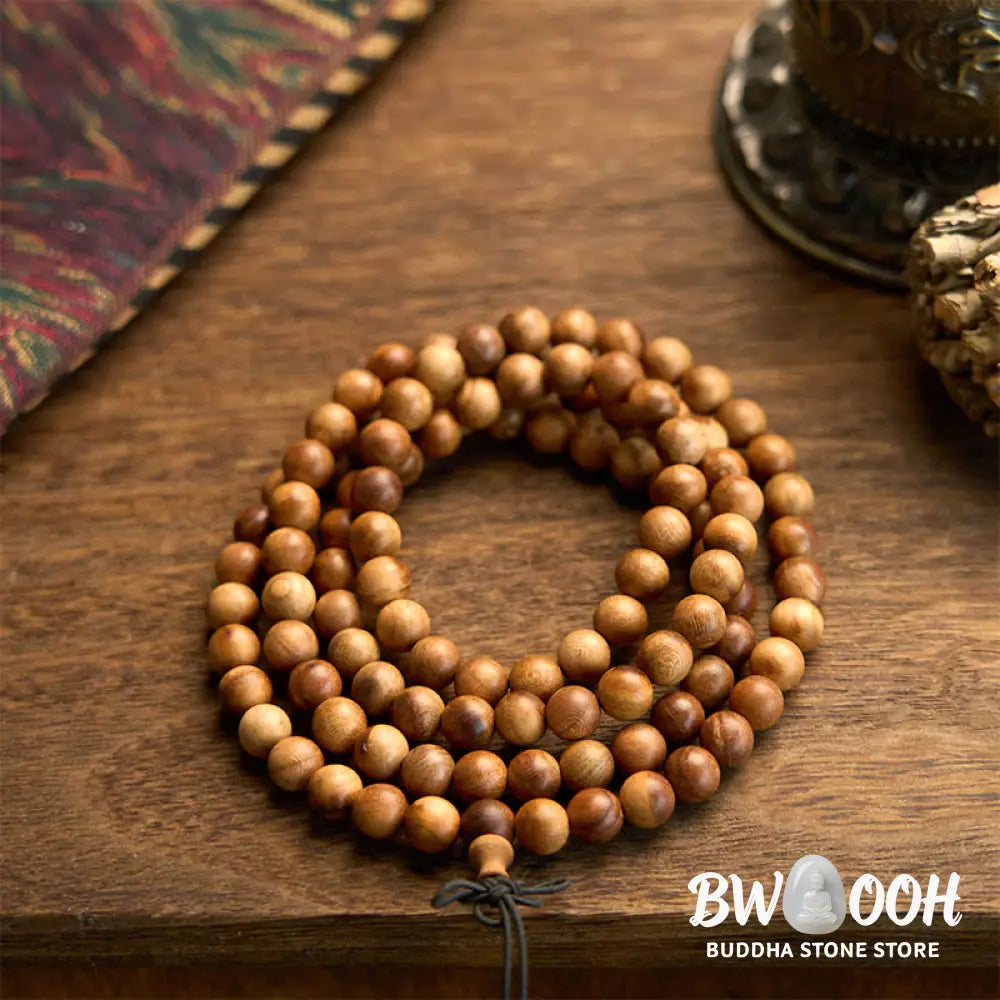 BWOOOH 108 Mala Beads, hand-polished Lightning Strike Peach Wood protection bracelet, 8mm beads on elastic string, worn by a unisex model, symbolizing divine energy and spiritual balance. - View 8