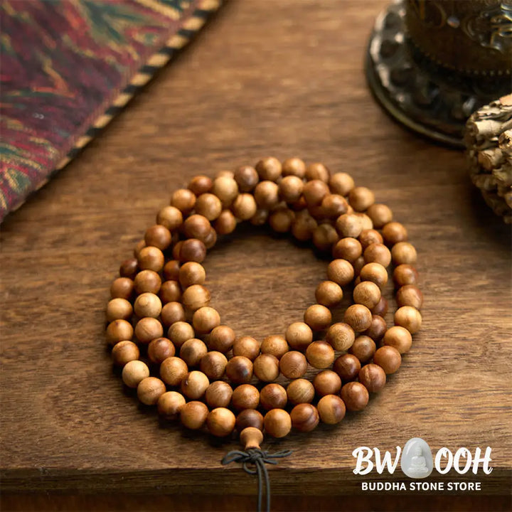 BWOOOH 108 Mala Beads, hand-polished Lightning Strike Peach Wood protection bracelet, 8mm beads on elastic string, worn by a unisex model, symbolizing divine energy and spiritual balance. - View 8