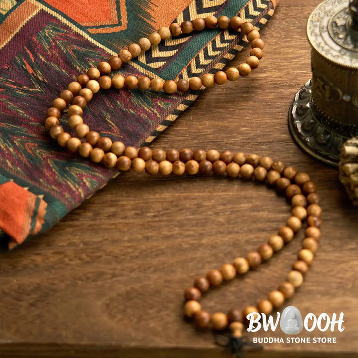 BWOOOH 108 Mala Beads, hand-polished Lightning Strike Peach Wood protection bracelet, 8mm beads on elastic string, worn by a unisex model, symbolizing divine energy and spiritual balance. - View 5