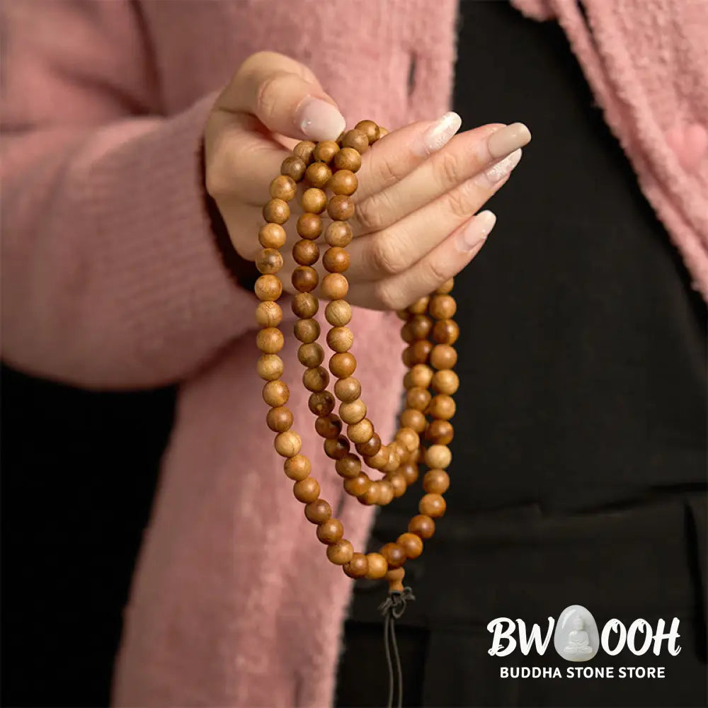 BWOOOH 108 Mala Beads, hand-polished Lightning Strike Peach Wood protection bracelet, 8mm beads on elastic string, worn by a unisex model, symbolizing divine energy and spiritual balance. - View 3