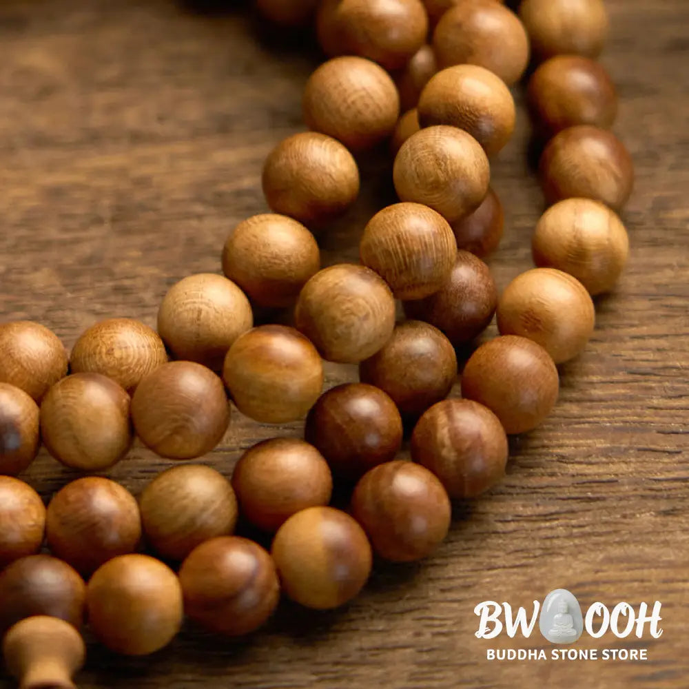 BWOOOH 108 Mala Beads, hand-polished Lightning Strike Peach Wood protection bracelet, 8mm beads on elastic string, worn by a unisex model, symbolizing divine energy and spiritual balance. - View 9