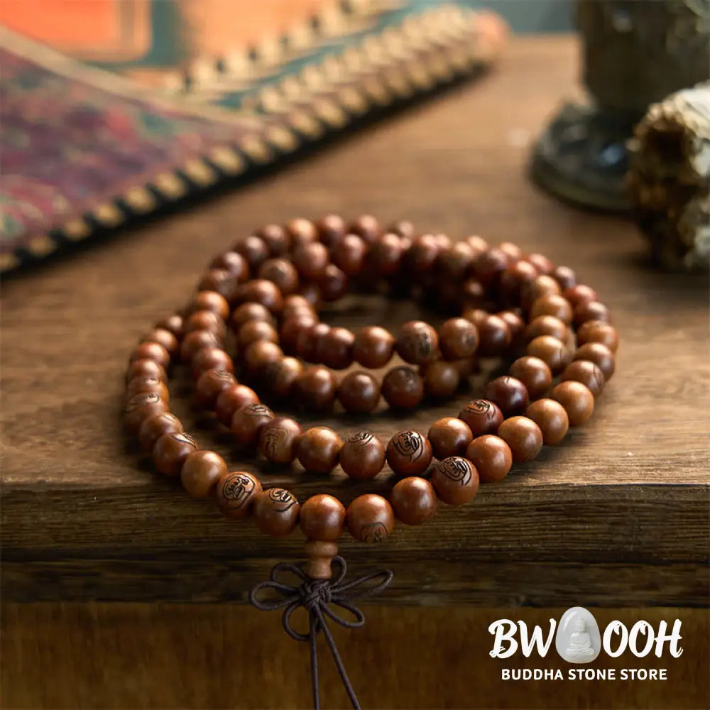 BWOOOH 108 Mala meditation bracelet crafted from authentic lightning-struck jujube wood, featuring individually engraved Golden Light Mantra beads. Unisex design with an elastic string for spiritual protection and mindful practice. - View 7