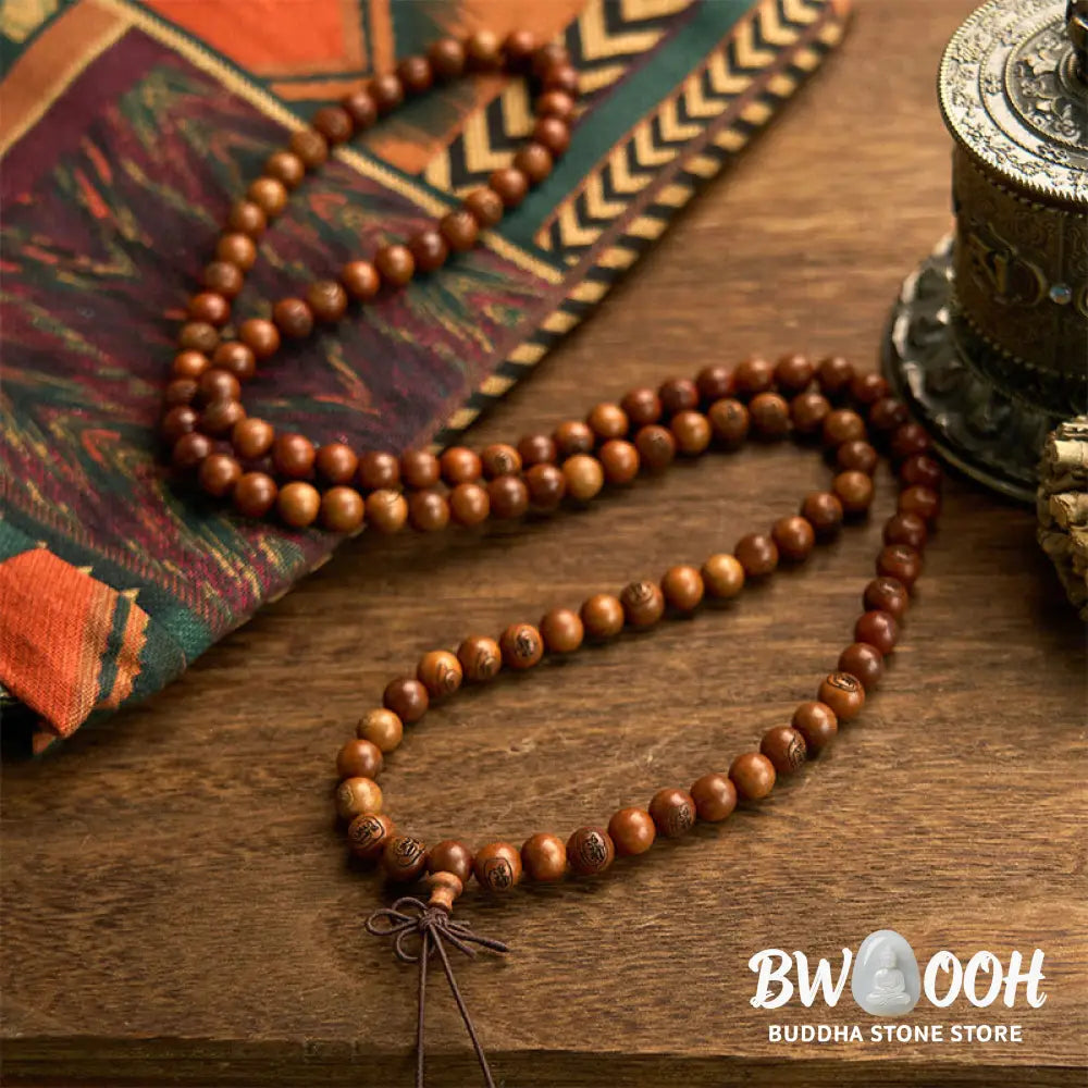 BWOOOH 108 Mala meditation bracelet crafted from authentic lightning-struck jujube wood, featuring individually engraved Golden Light Mantra beads. Unisex design with an elastic string for spiritual protection and mindful practice. - View 9
