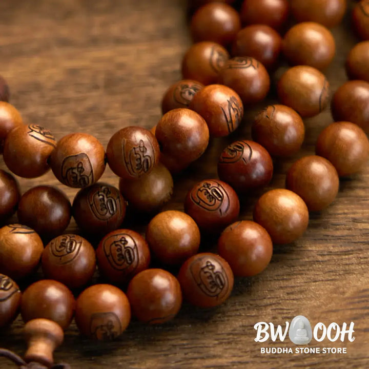 BWOOOH 108 Mala meditation bracelet crafted from authentic lightning-struck jujube wood, featuring individually engraved Golden Light Mantra beads. Unisex design with an elastic string for spiritual protection and mindful practice. - View 10