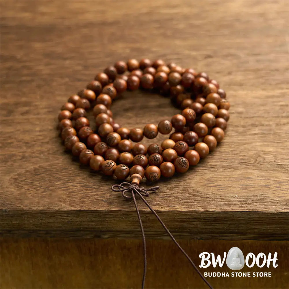 BWOOOH 108 Mala meditation bracelet crafted from authentic lightning-struck jujube wood, featuring individually engraved Golden Light Mantra beads. Unisex design with an elastic string for spiritual protection and mindful practice. - View 8