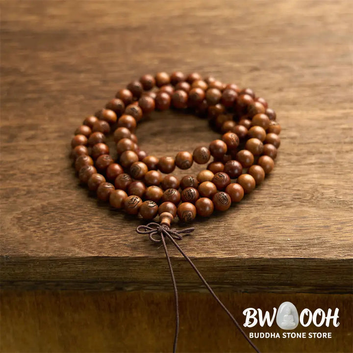 BWOOOH 108 Mala meditation bracelet crafted from authentic lightning-struck jujube wood, featuring individually engraved Golden Light Mantra beads. Unisex design with an elastic string for spiritual protection and mindful practice. - View 8