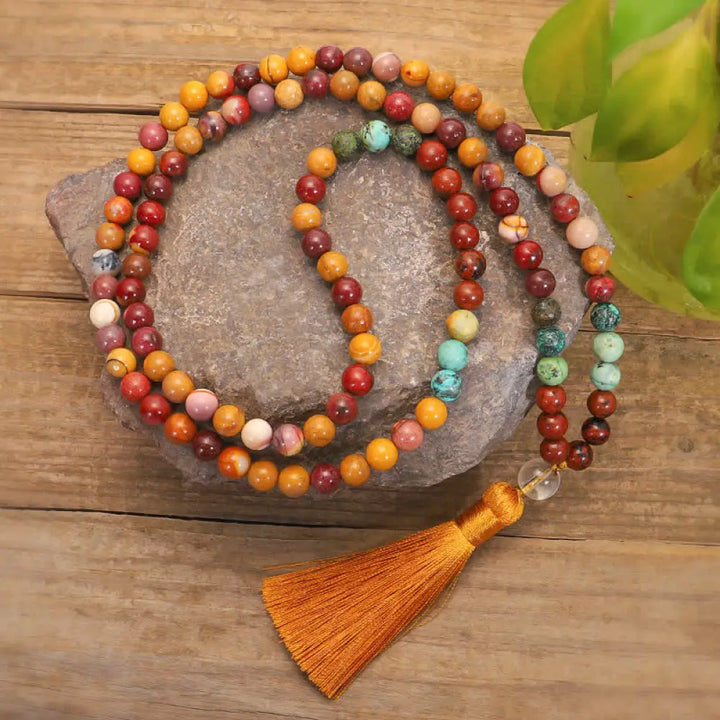 BWOOOH 108 Mookaite Mala Beads, showcasing vibrant earthy tones of red, yellow, and cream, styled as both an 86cm tassel necklace and a 16-19cm spiritual protection bracelet, crafted for emotional growth and mindfulness. - View 6