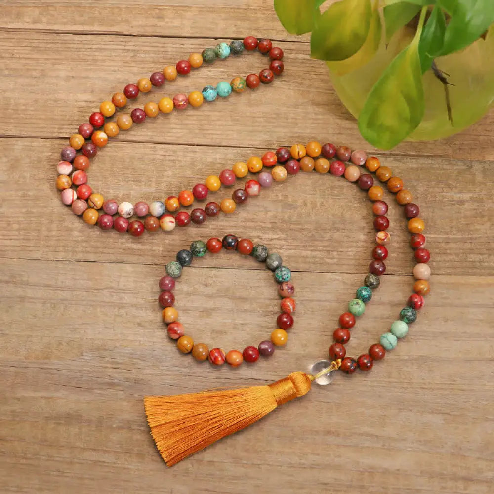 BWOOOH 108 Mookaite Mala Beads, showcasing vibrant earthy tones of red, yellow, and cream, styled as both an 86cm tassel necklace and a 16-19cm spiritual protection bracelet, crafted for emotional growth and mindfulness.