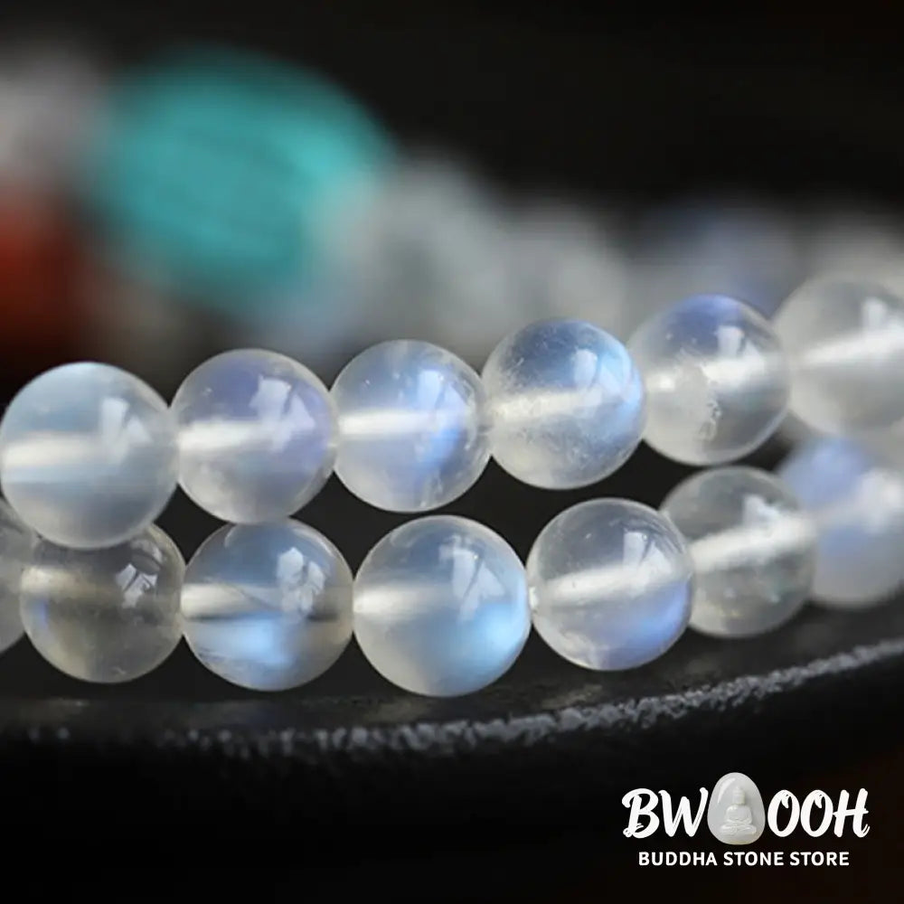 BWOOOH 108 Mala Beads bracelet handcrafted with shimmering Moonstone, warm Amber, vibrant Turquoise, and an engraved Lotus symbol, ideal for meditation and spiritual healing. - View 7