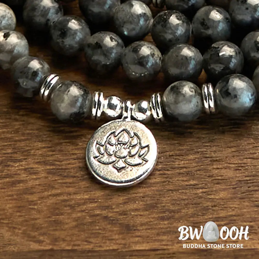 BWOOOH 108-bead multi-layer Black Glitter Stone Mala bracelet with engraved lotus pendant, symbolizing purity and strength, on a neutral background. - View 6