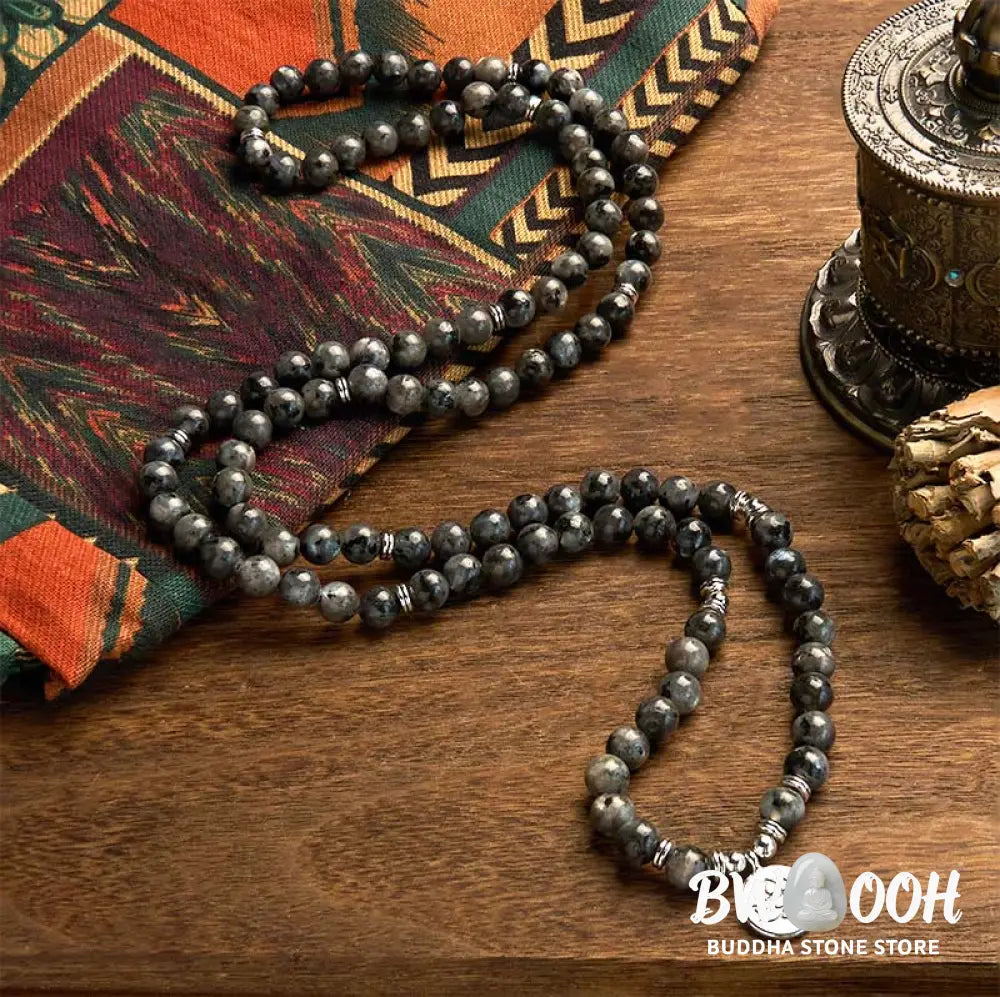 BWOOOH 108-bead multi-layer Black Glitter Stone Mala bracelet with engraved lotus pendant, symbolizing purity and strength, on a neutral background. - View 2