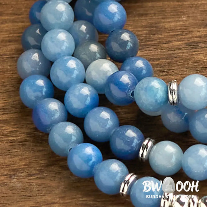 BWOOOH 108-bead multi-layer bracelet featuring 8mm natural Blue Aventurine beads and an engraved lotus pendant, symbolizing calm, spiritual growth, and inner peace. - View 11