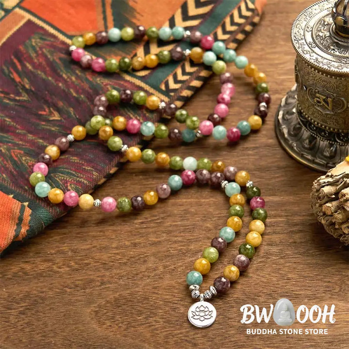 A multi-layer BWOOOH 108 Mala Beads Wisdom Bracelet featuring natural tourmaline beads and an engraved lotus pendant, symbolizing spiritual growth, calm, and protection. Ideal for mindful practice. - View 2