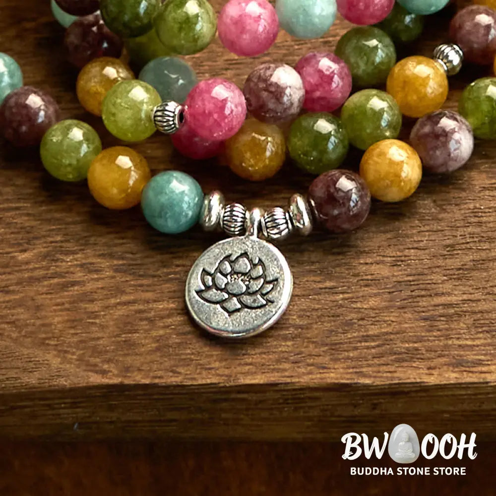 A multi-layer BWOOOH 108 Mala Beads Wisdom Bracelet featuring natural tourmaline beads and an engraved lotus pendant, symbolizing spiritual growth, calm, and protection. Ideal for mindful practice. - View 7