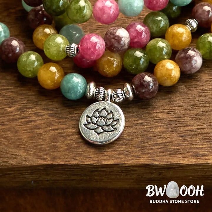 A multi-layer BWOOOH 108 Mala Beads Wisdom Bracelet featuring natural tourmaline beads and an engraved lotus pendant, symbolizing spiritual growth, calm, and protection. Ideal for mindful practice. - View 7