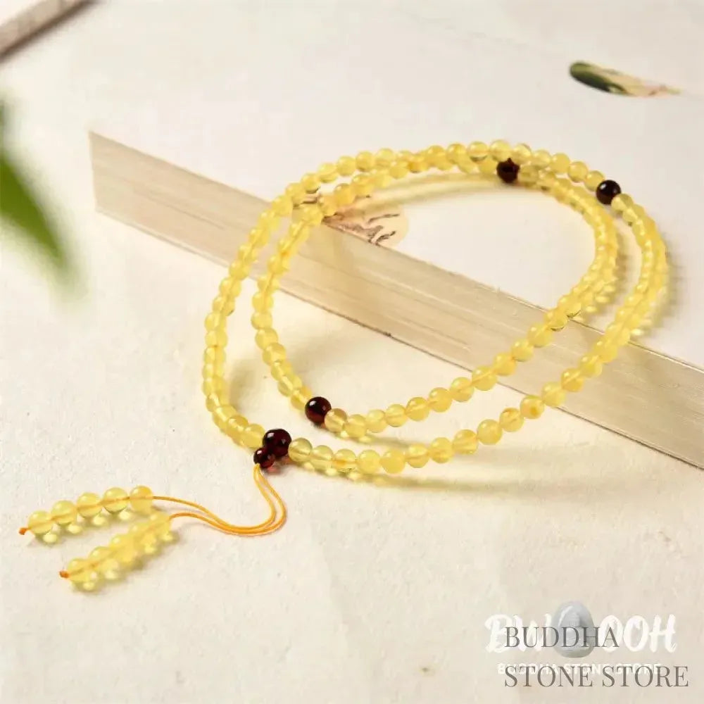 BWOOOH 108 Mala meditation bracelet featuring 5mm natural cherry amber beads, designed to clear anxiety, promote focus, and bring spiritual balance. - View 3