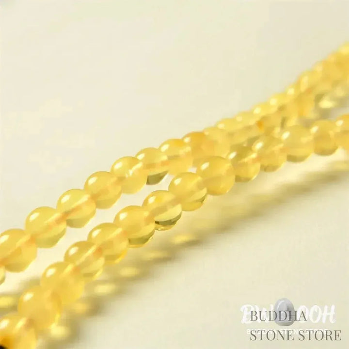 BWOOOH 108 Mala meditation bracelet featuring 5mm natural cherry amber beads, designed to clear anxiety, promote focus, and bring spiritual balance. - View 4